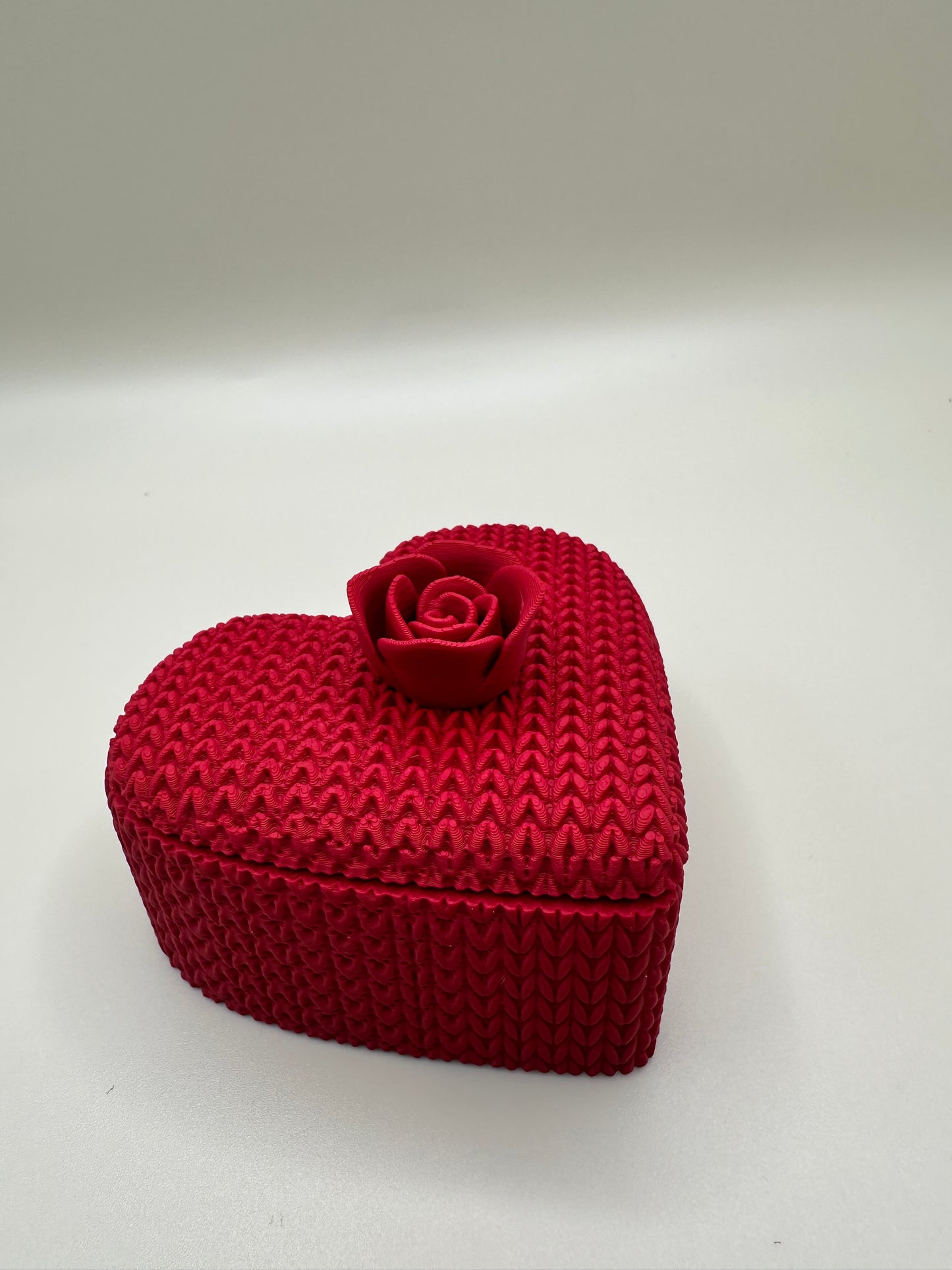 Decorative heart box featuring intricate rose design