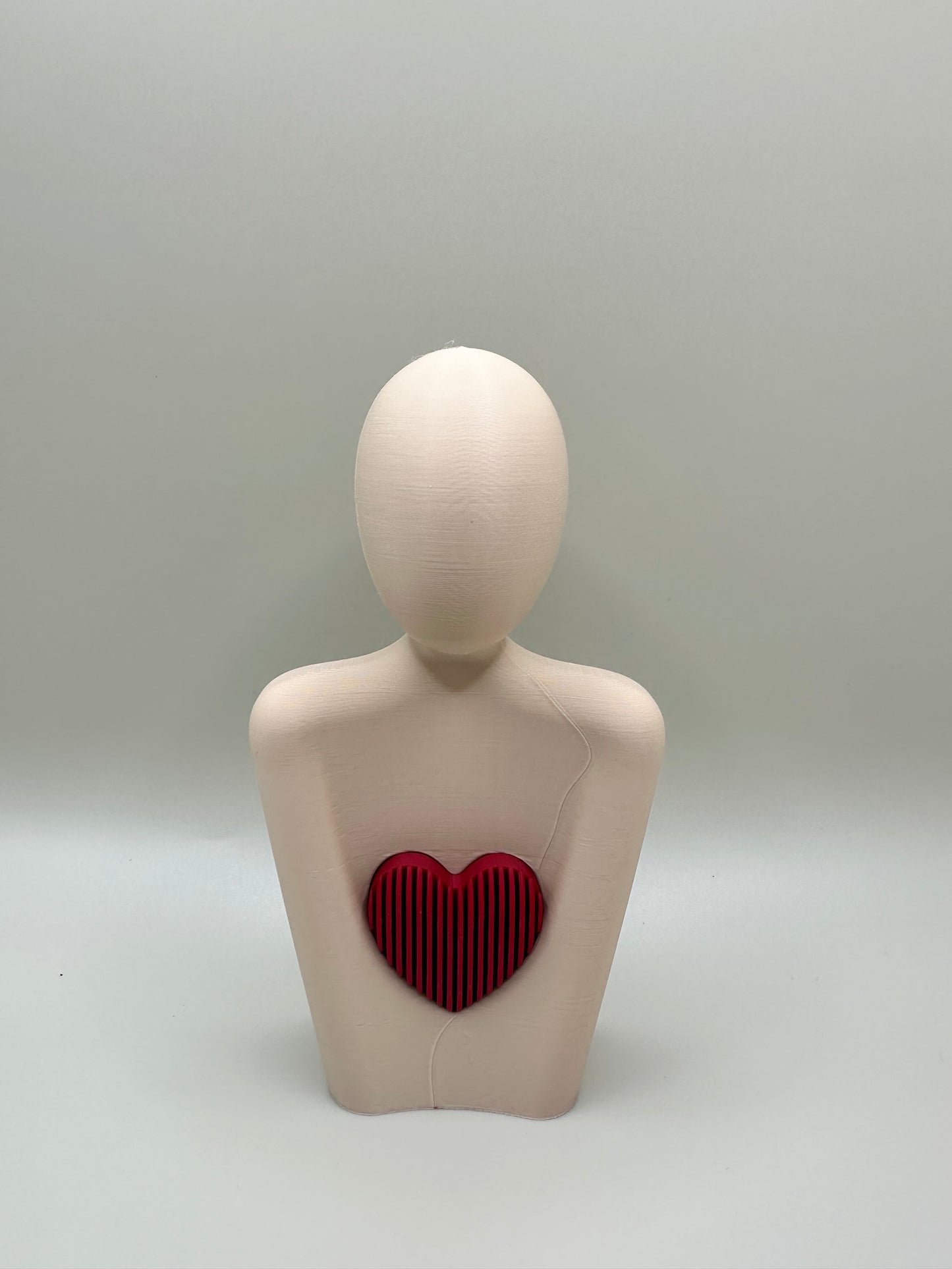 Minimalist 3D printed sculpture symbolizing love, care, and emotional connection.