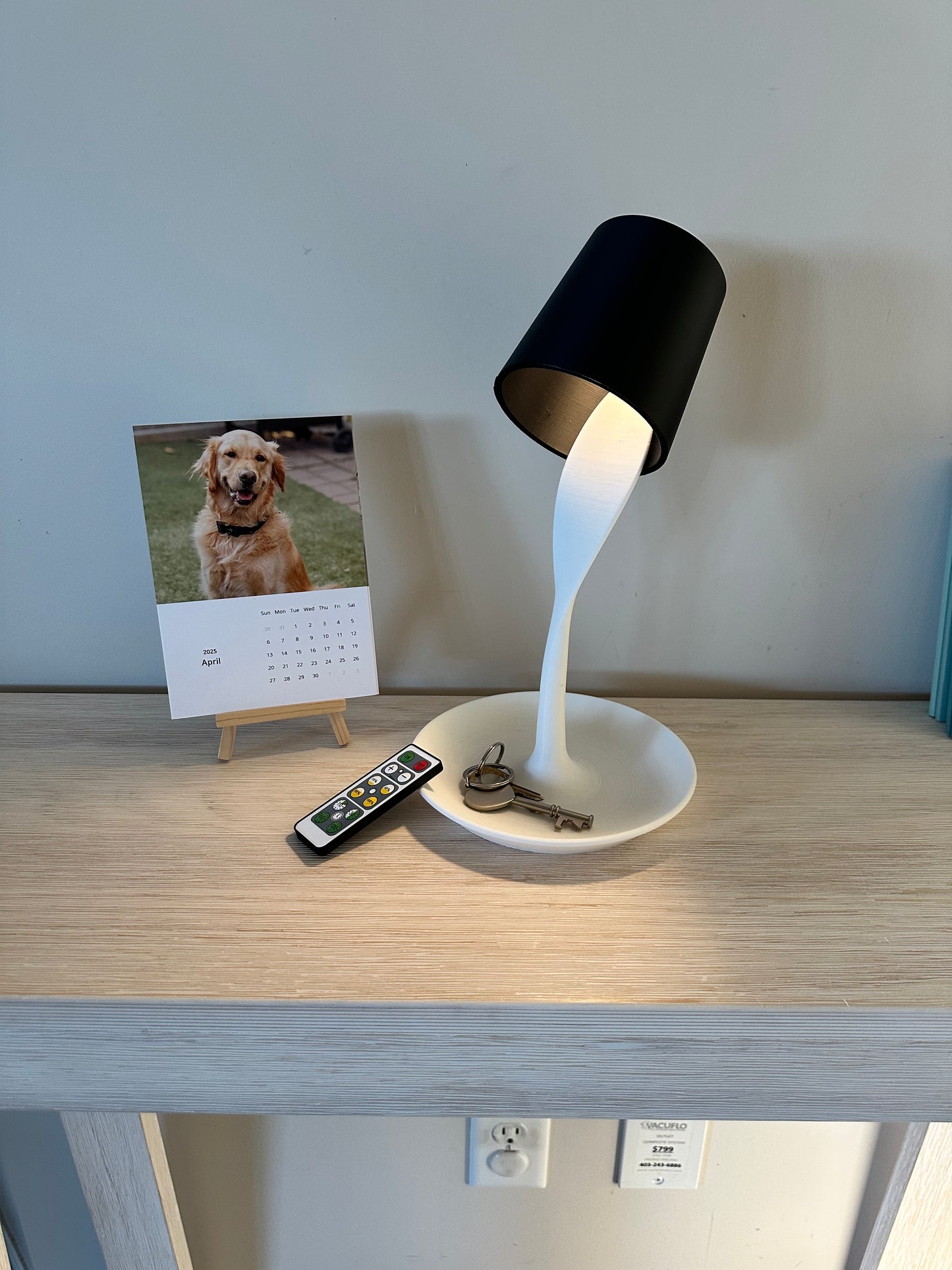 Creative desk lamp designed to look like spilled milk or coffee with soft lighting