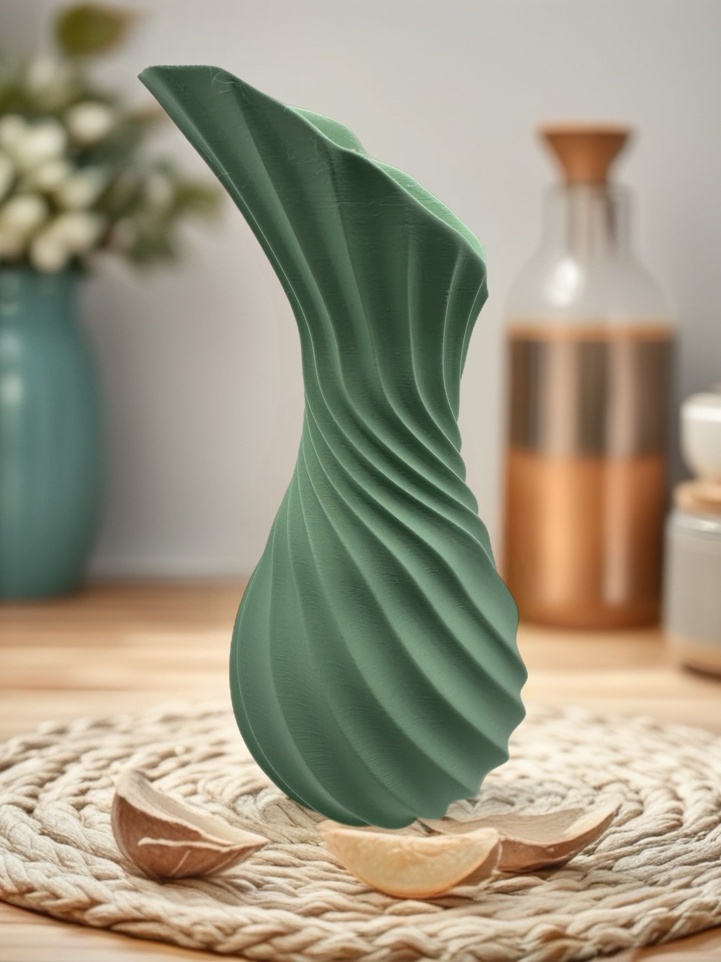 Contemporary decor featuring a twisted beige vase showcased in a bright, stylish workspace with natural light.