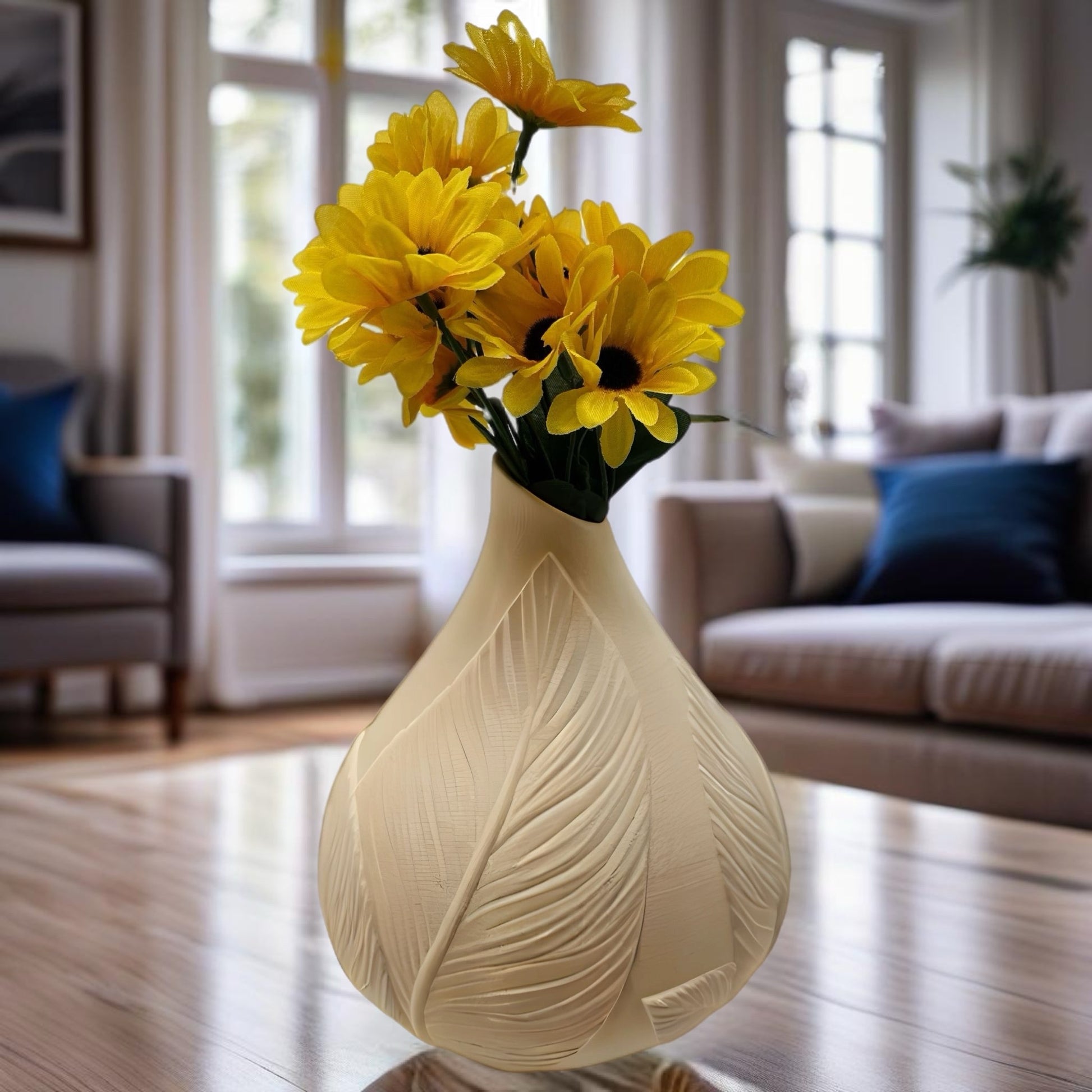 3D printed cream vase with raised leaf wrap design