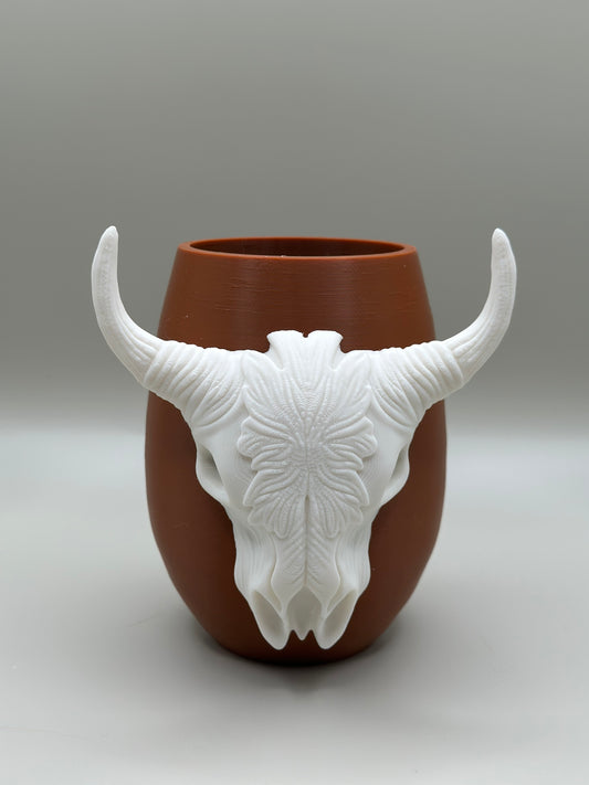 3D printed bull skull mounted on terracotta vase
