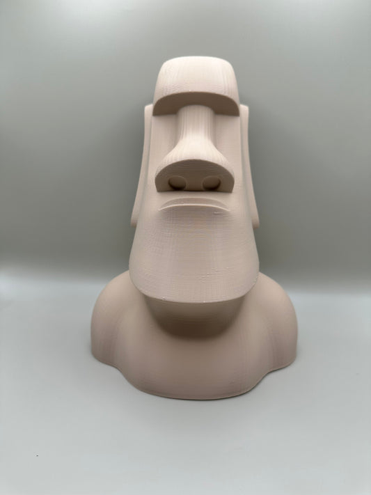 Moai statue coin bank in soft beige, 3D printed with minimalist curves by Pilu Studio.