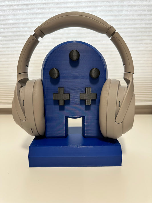 3D printed Gameboy-style headset holder displayed with over-ear headphones