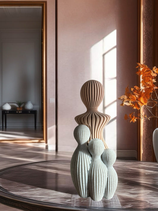 3D printed sculpture of a mother with three children in minimalist style