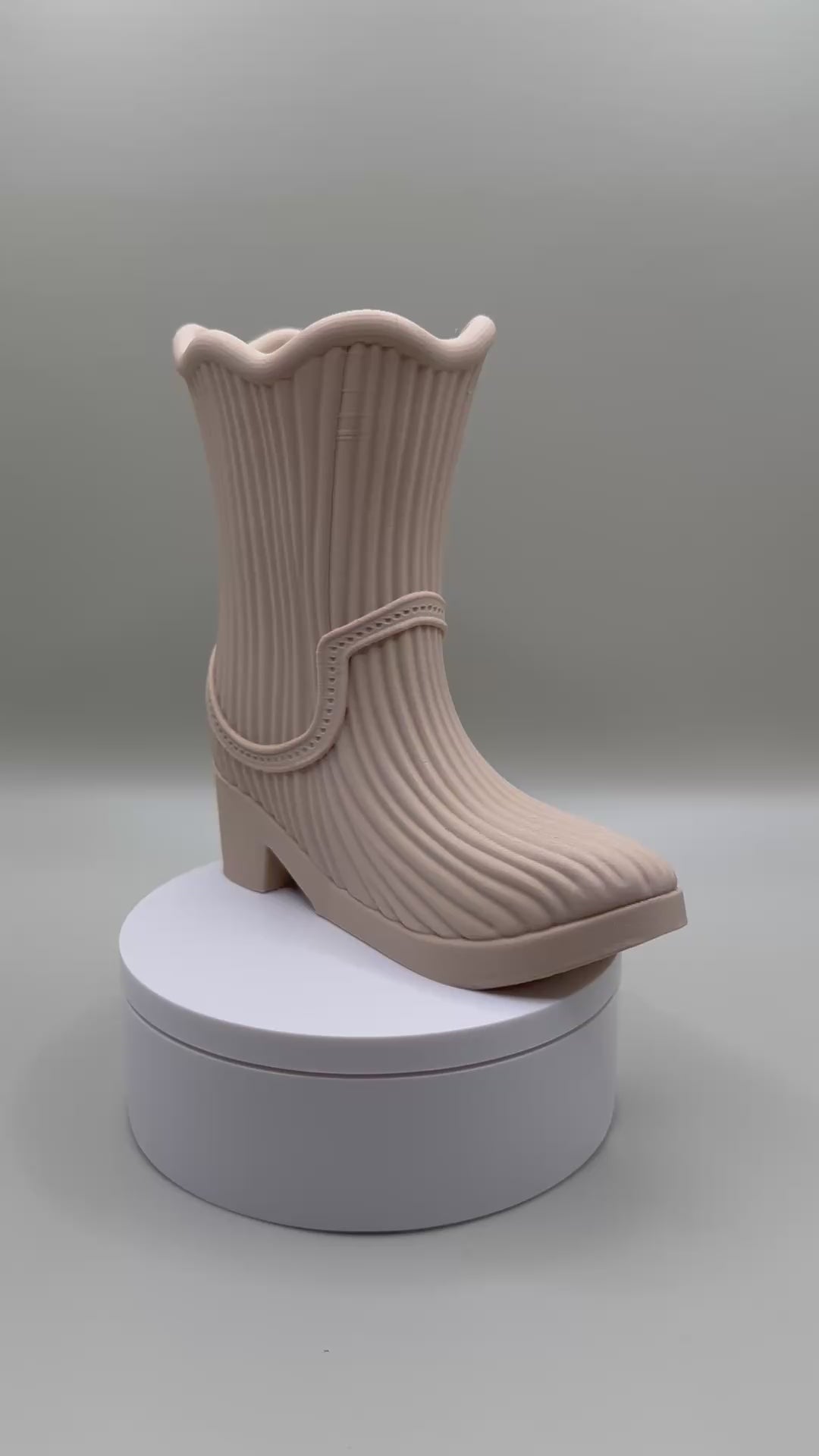 Cute cowboy boot-shaped vase or desk accessory